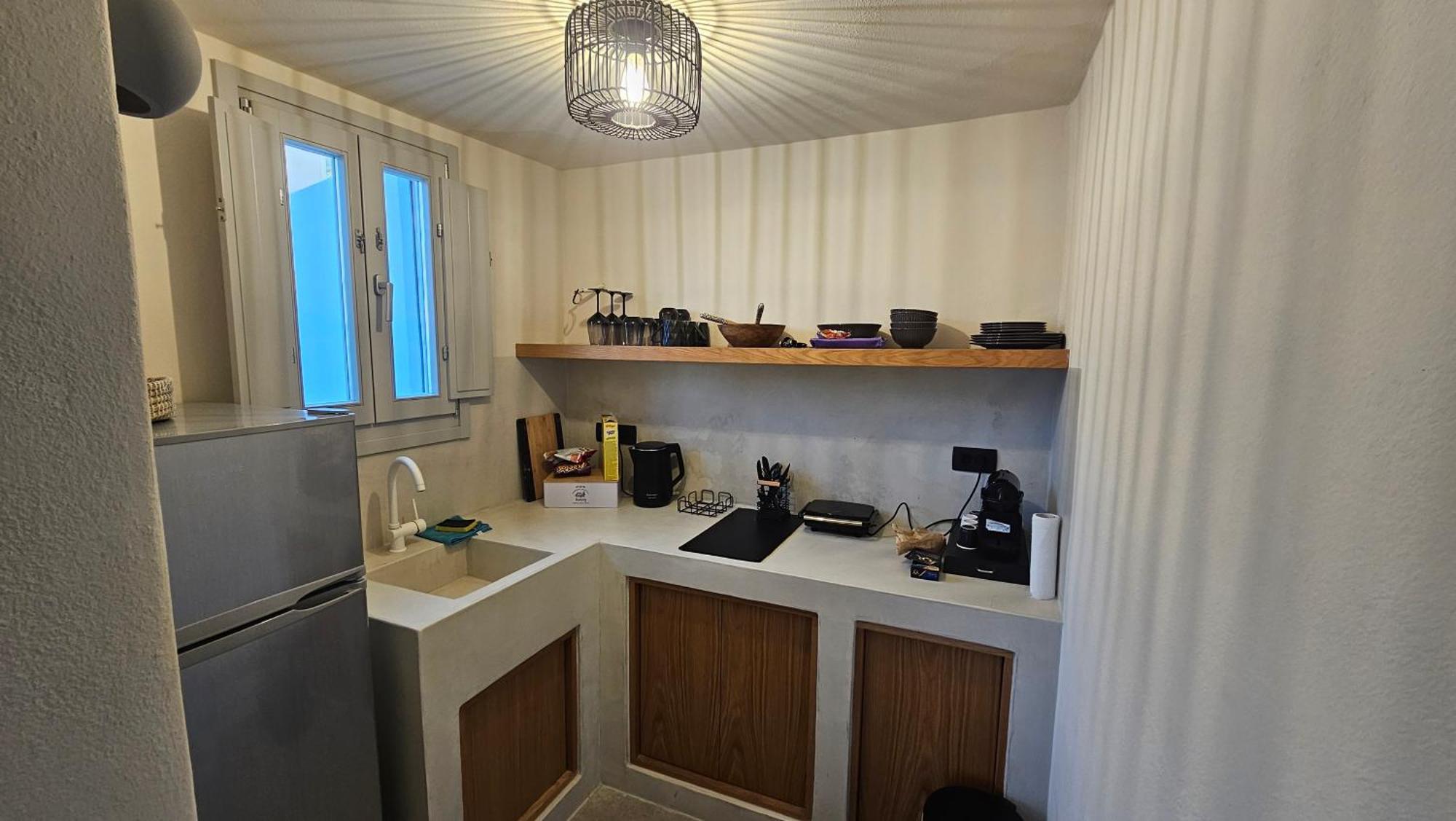 Petroma Cave Suites Vourvoulos ภายนอก รูปภาพ